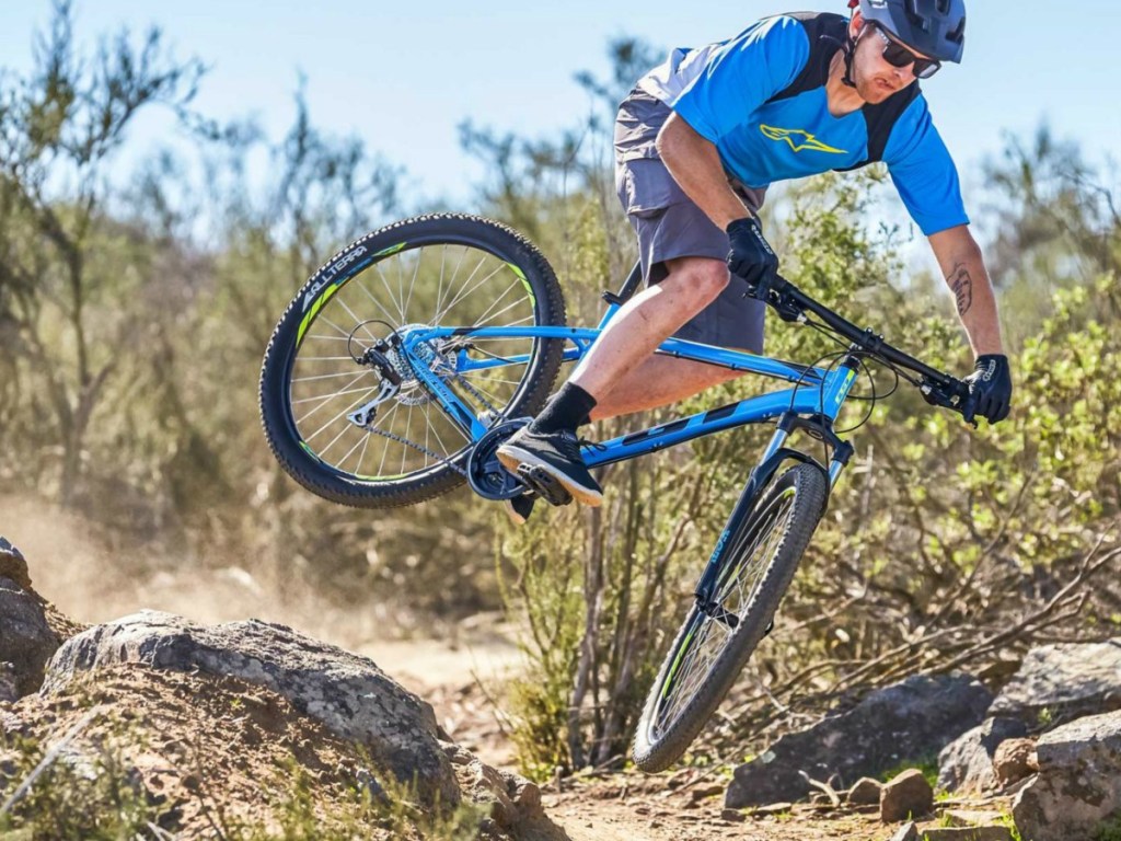 Man riding GT Aggressor Bike on outdoor trail