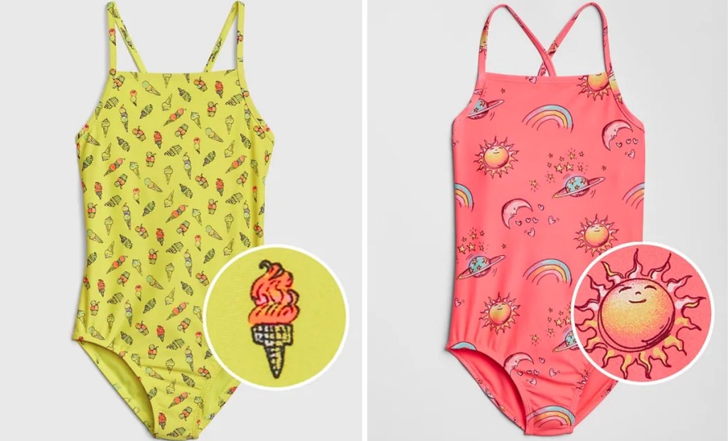 yellow one-piece swimsuit covered in ice cream icons next to to pink suit with rainbows, suns, moons, and planets