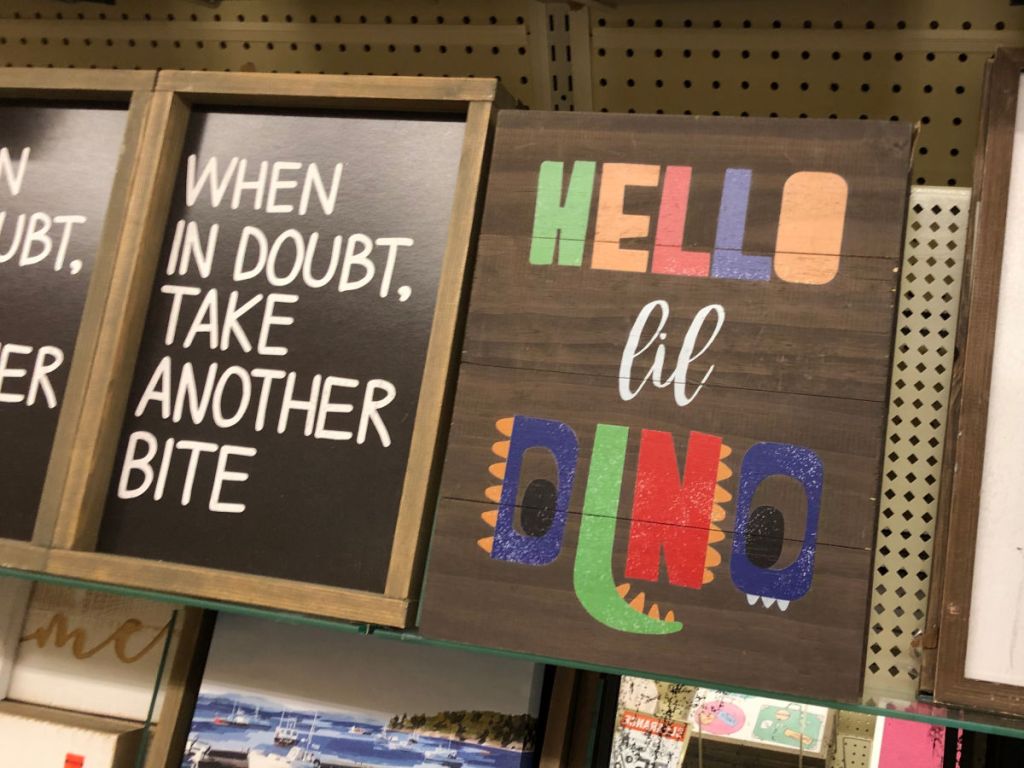 Hello Lil Dino Sign and When in doubt, take another bite sign at Hobby Lobby