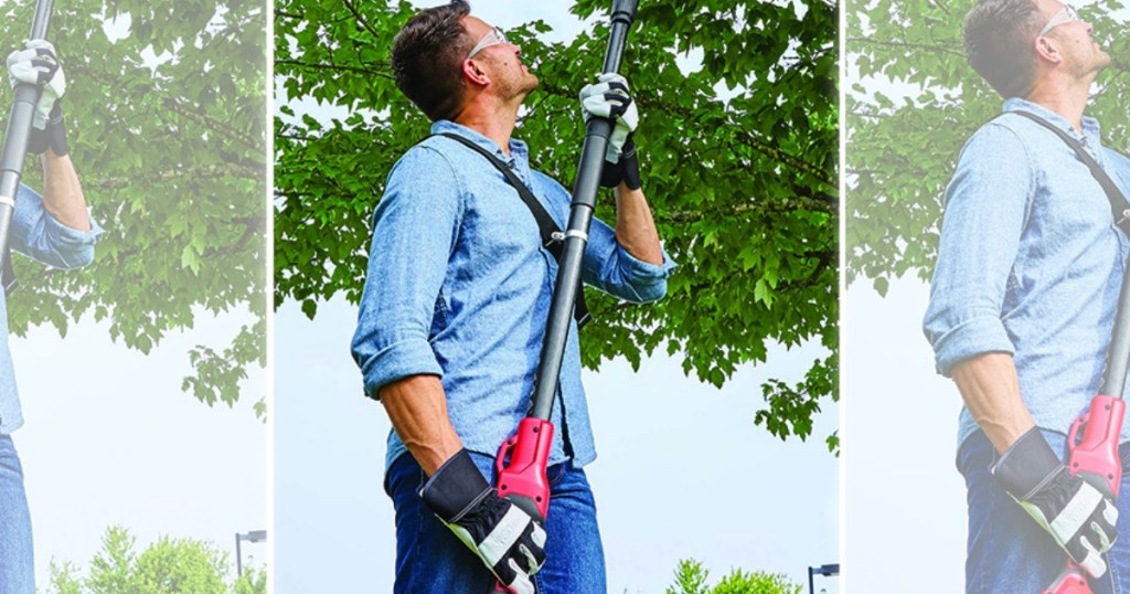 man holding pole saw