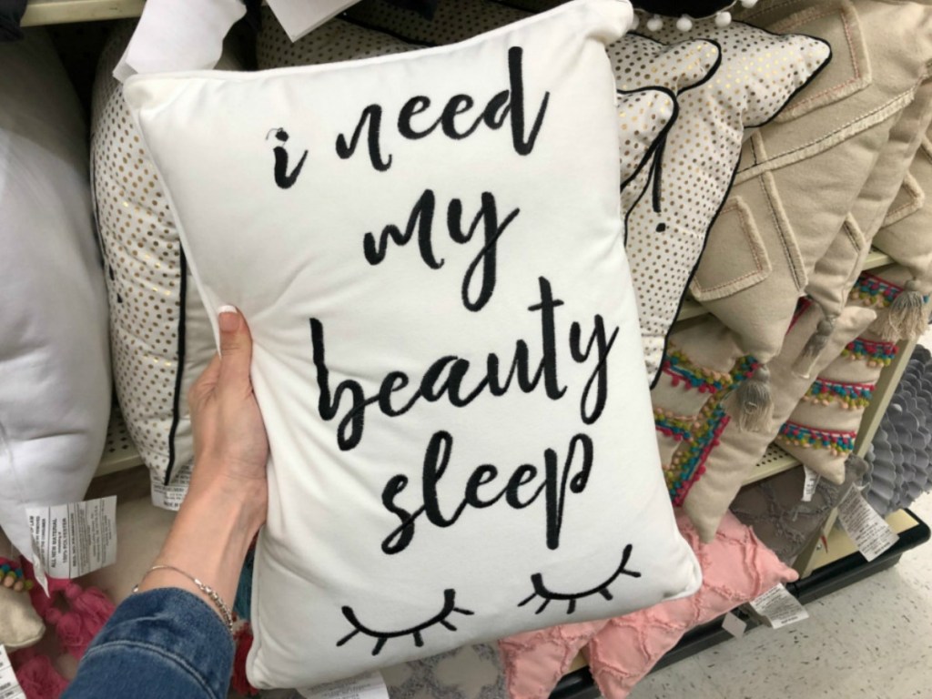 white rectangular pillow with i need my beauty sleep written on it