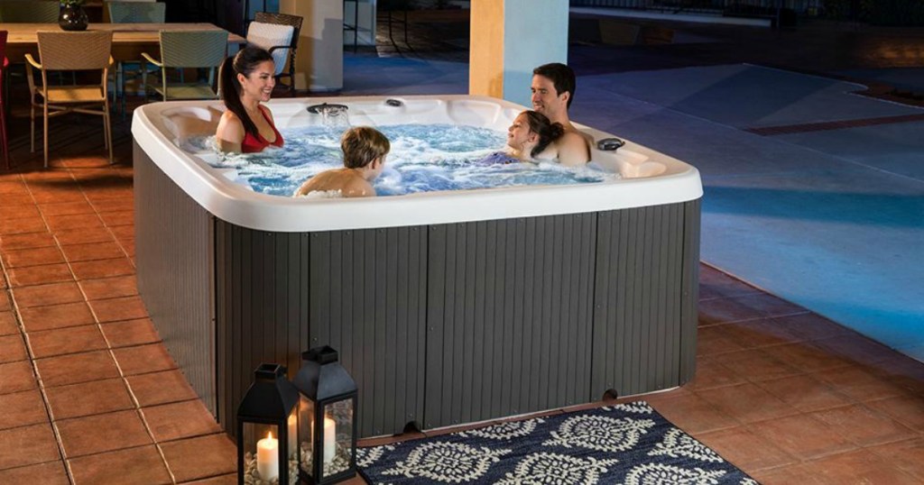 family in Lifesmart 90-Jet 7-Person Standard Spa on patio