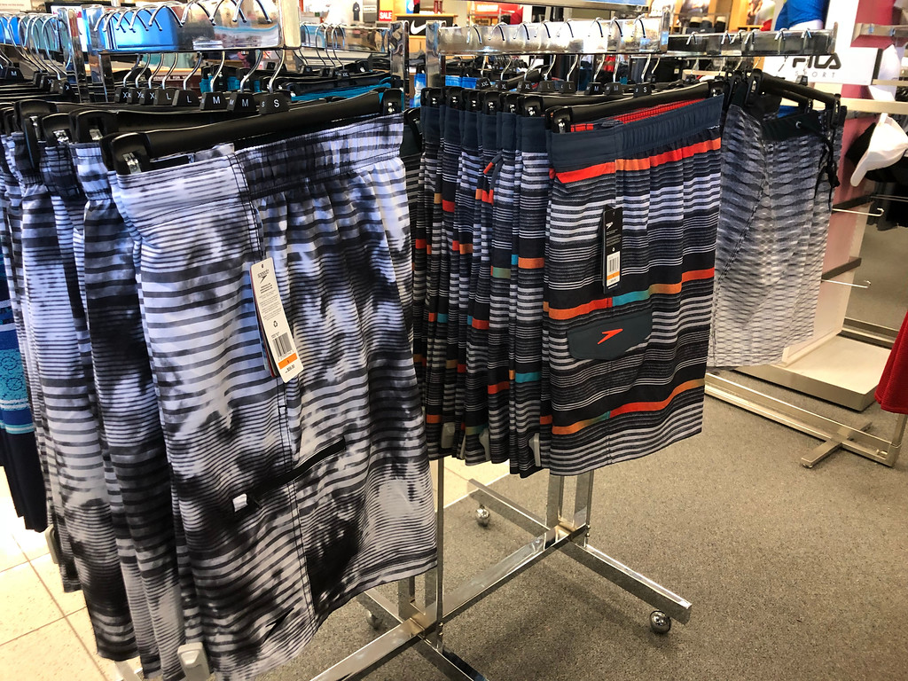 men's swim trunks hanging up at Kohl's