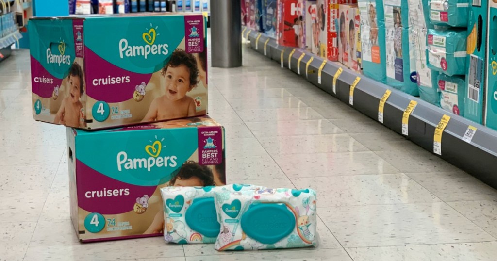 2 Boxes of Pampers Cruisers & Pampers Wipes stacked on floor at Walgreens