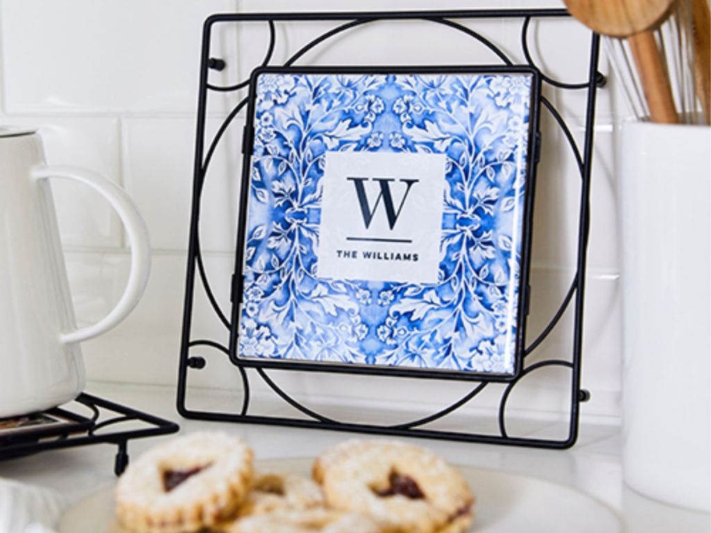 Custom photo trivet in kitchen with cookies and tea kettle