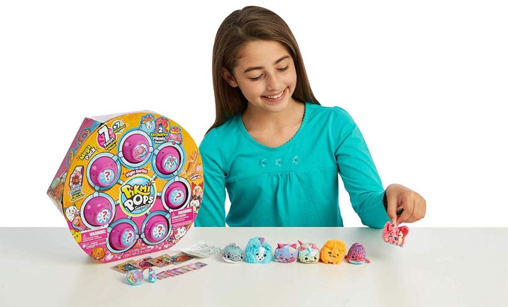 girl playing with pikmi pops