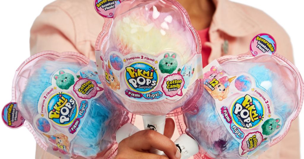 girl holding three pikmi pops suprise flips