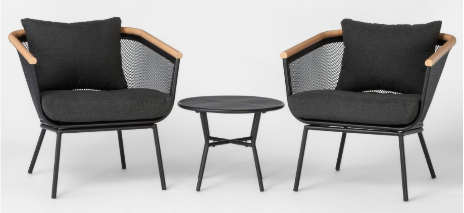 metal and wood patio charis with cushions and a small table