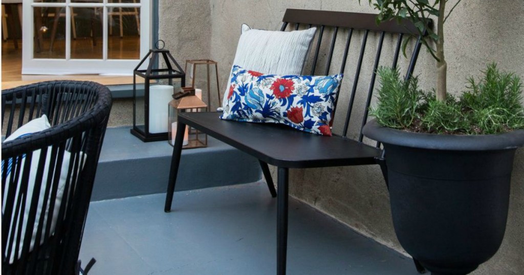 Metal loveseat bench on a patio