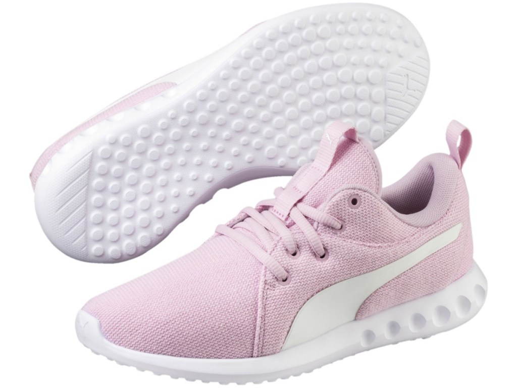 Pink Puma running shoes with white stripe