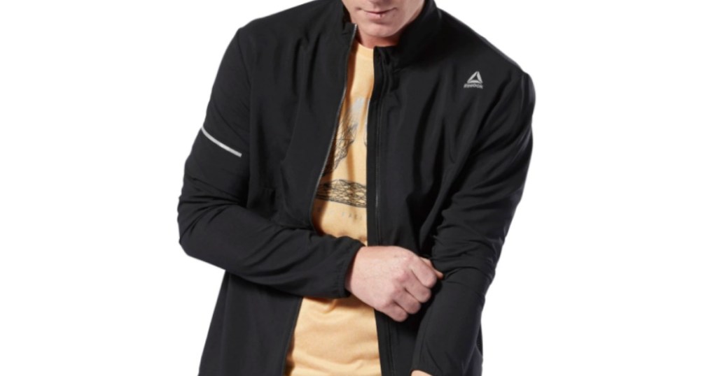 man wearing black reebok jacket