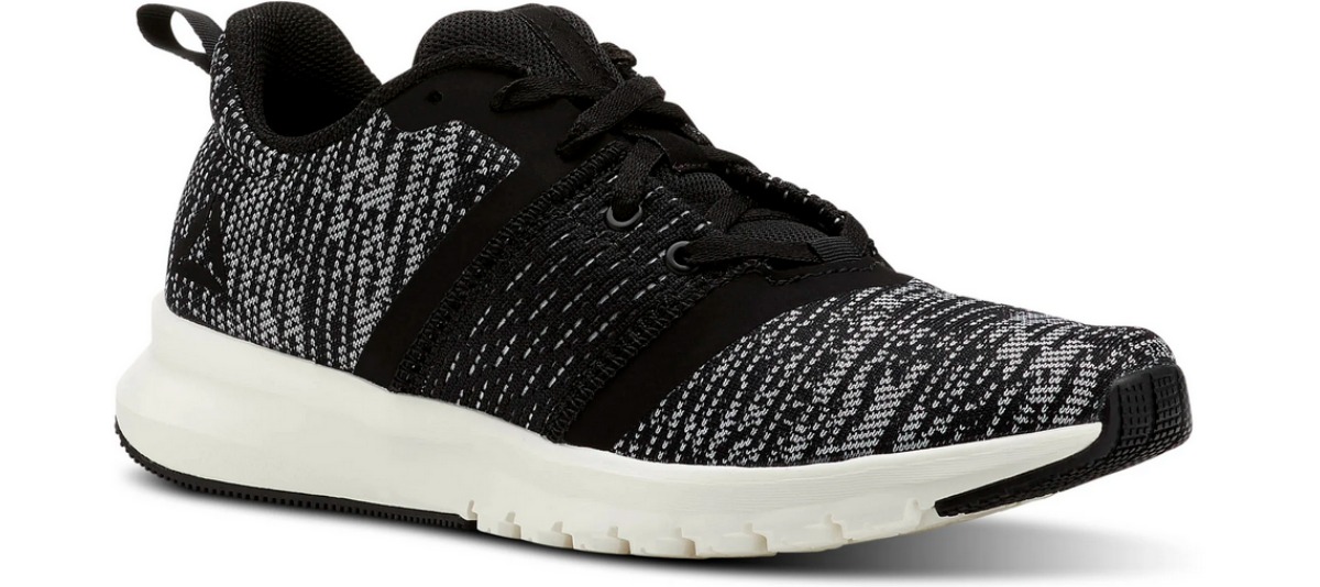 speckled black and gray Reebok running shoes