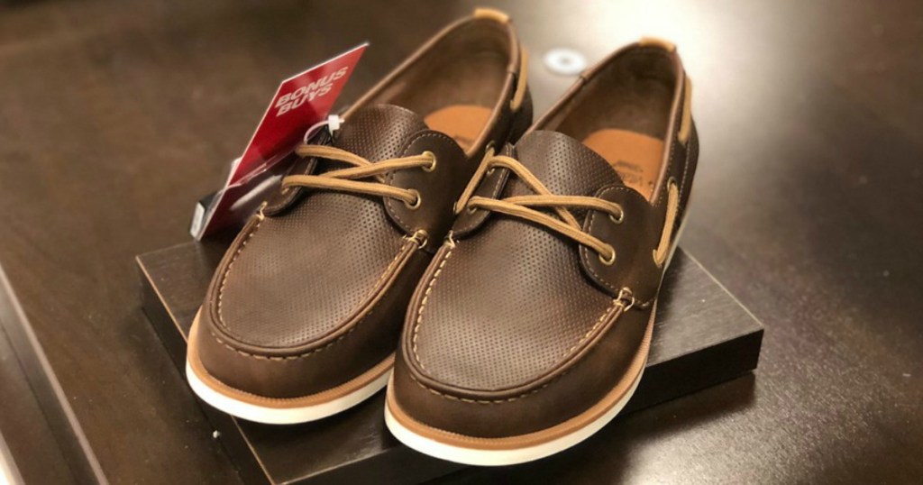 Sonoma Men's Boat Shoes sitting on a brown table