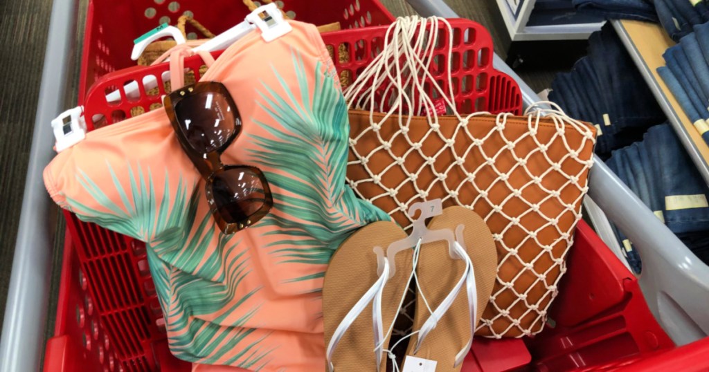 Coral and palm tree one piece with glasses, flip flops, and purse in target cart