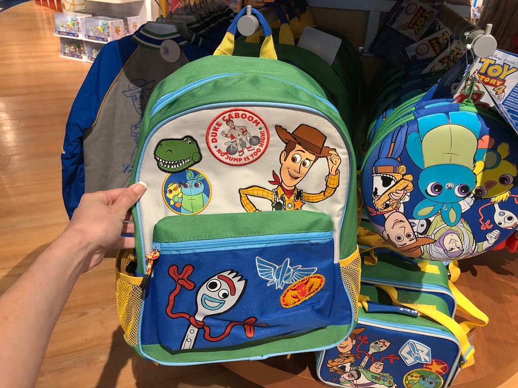 Toy Story 4 Backpack being held by a woman's hand at shopDisney 