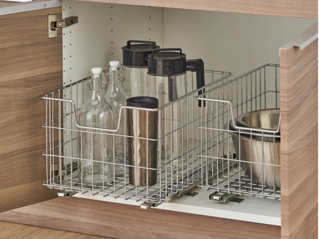 wire storage basket on track under sink