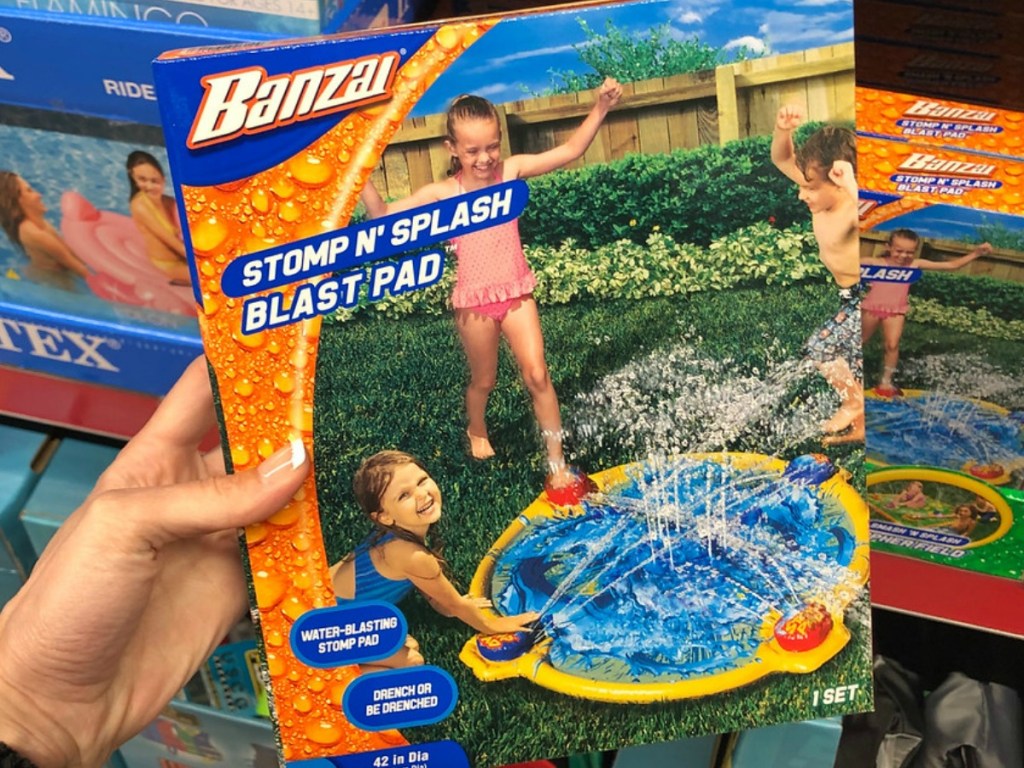 box with sprinkler toy and splash pad for kids