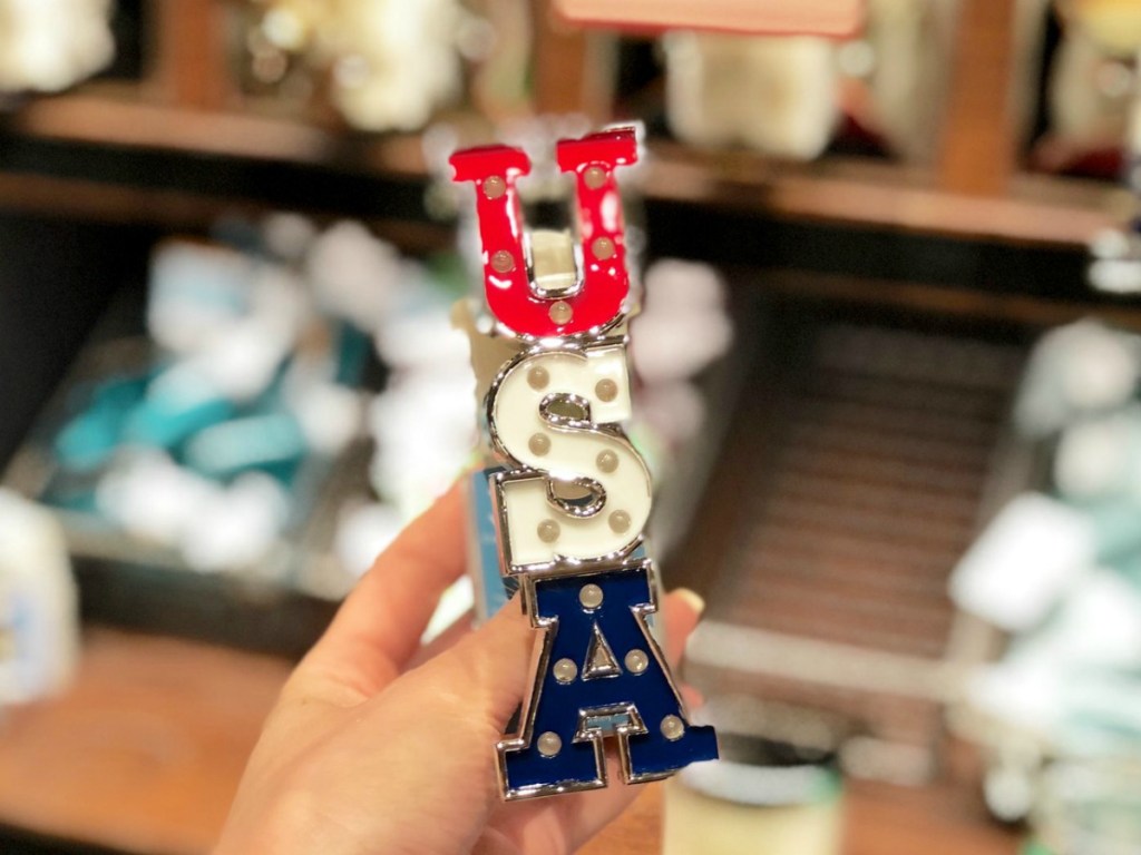 plug for wall with U S A on it in patriotic colors