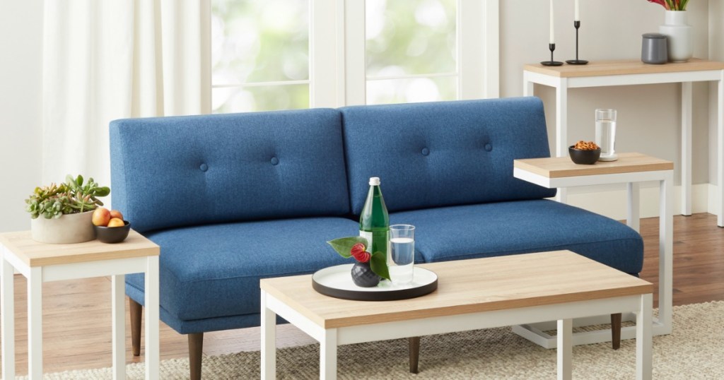 living room couch with small furniture around it
