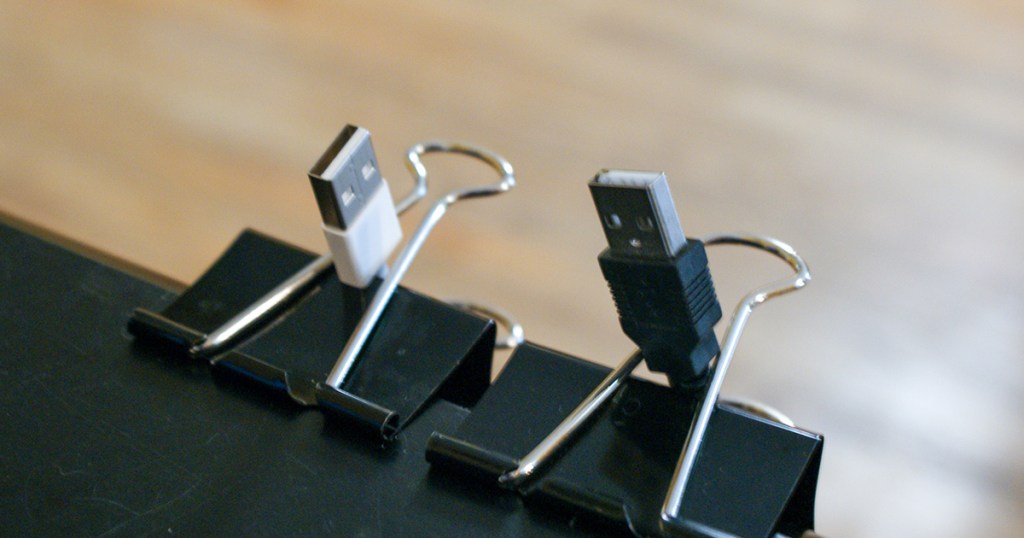 binder clips holding charging cords in place