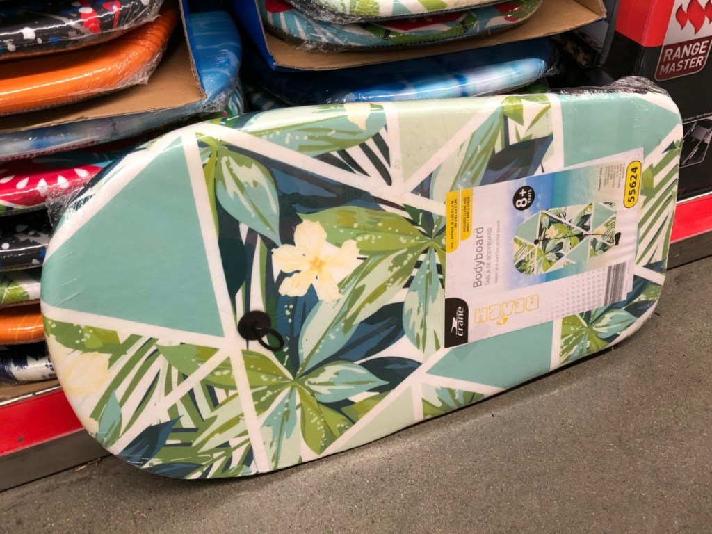 floral patterned body board by store display