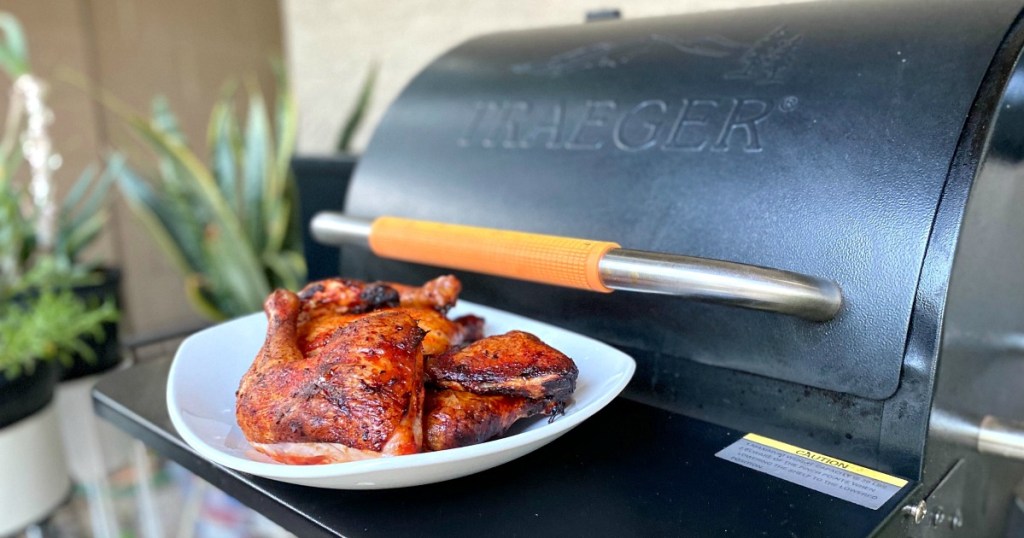 chicken in front of a traeger