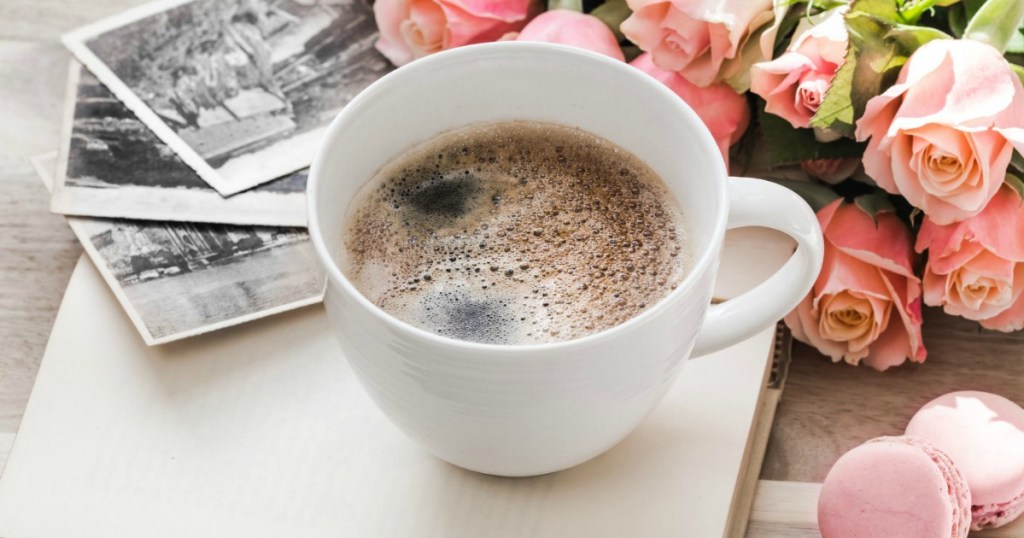 Coffee cup with pink roses and pictures