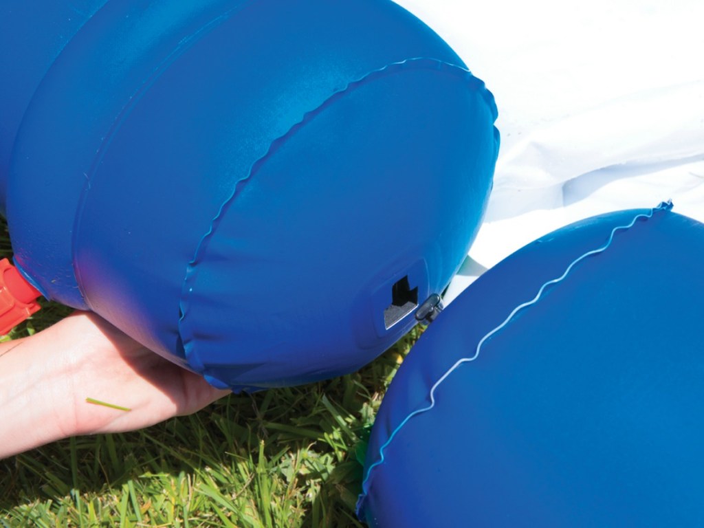 blue pontoons on a green yard