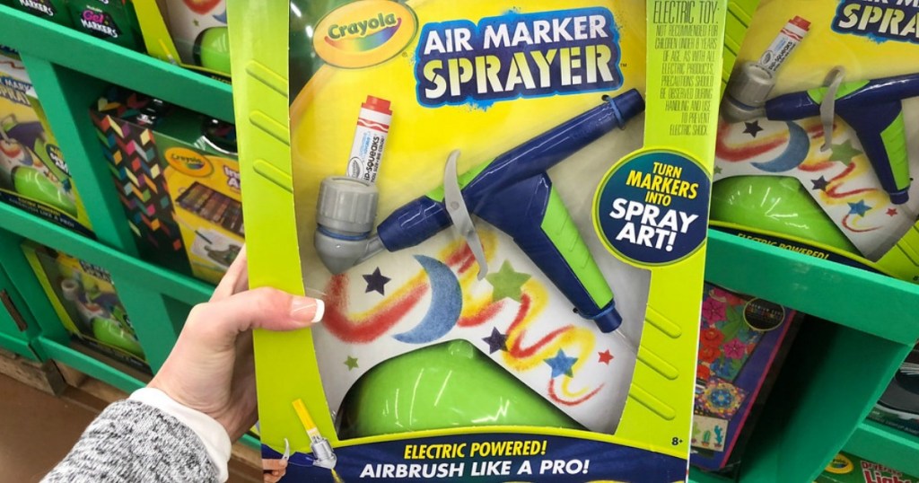 hand holding crayola air marker sprayer