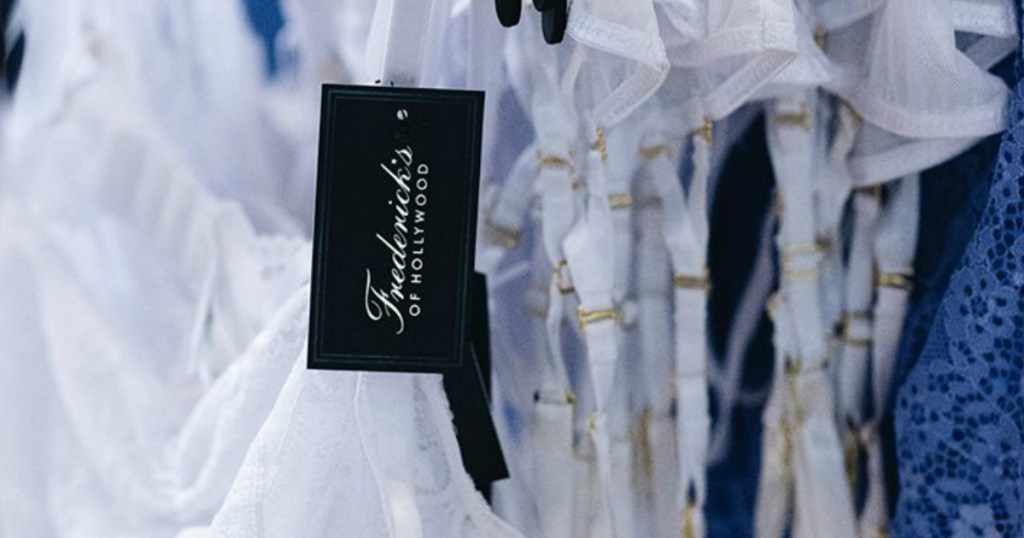 black store tag hanging from apparel