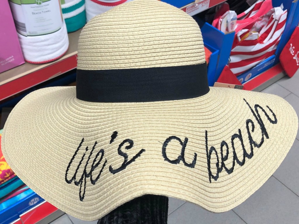 sun hat that says "life's a beach" in cursive