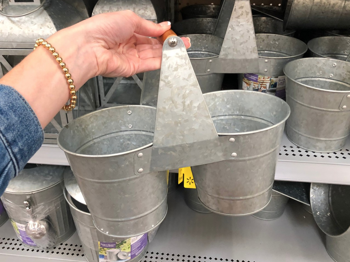 lady holding mainstays caddy at walmart 