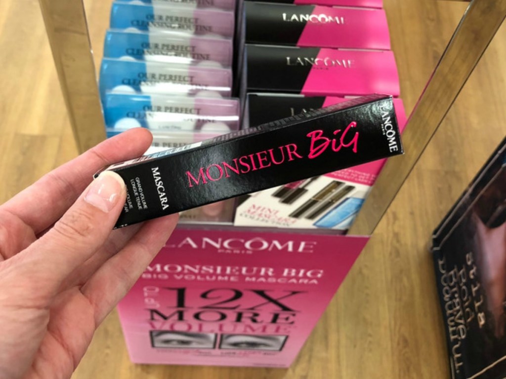 macara in a box being held by a hand