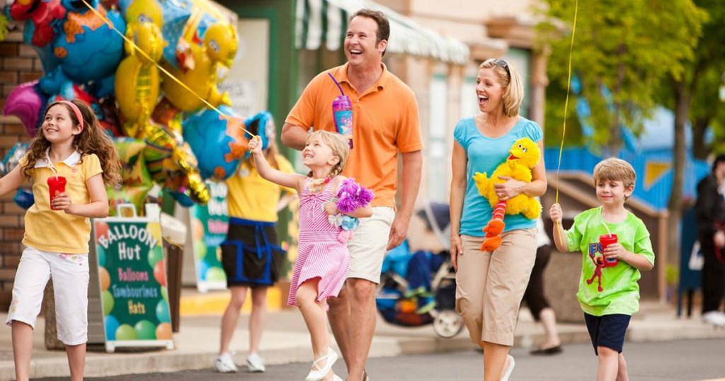 A family at Sesame Place, one of the parks affiliated with FREE SeaWorld military tickets through the Waves of Honor program