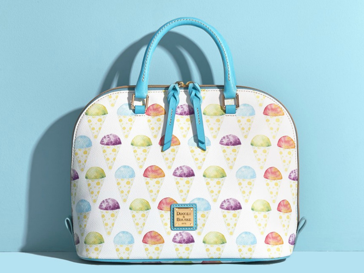 purse with snow cones on it on a blue background
