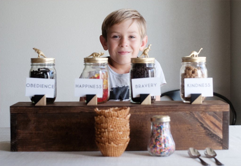 boy with jars of candy