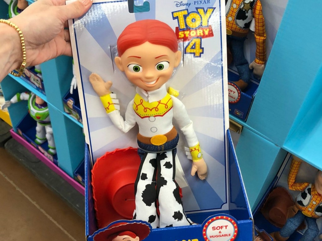 hand holding toy by store display