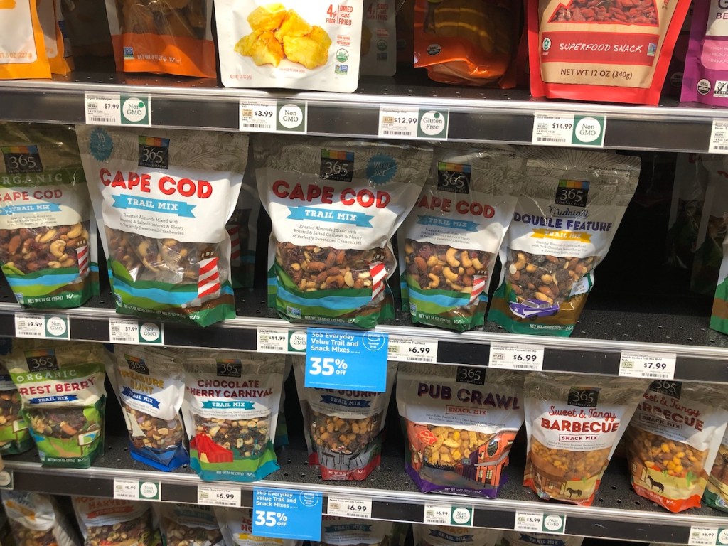 shelf of 365 Everyday Value Trail and Snack Mixes at whole foods