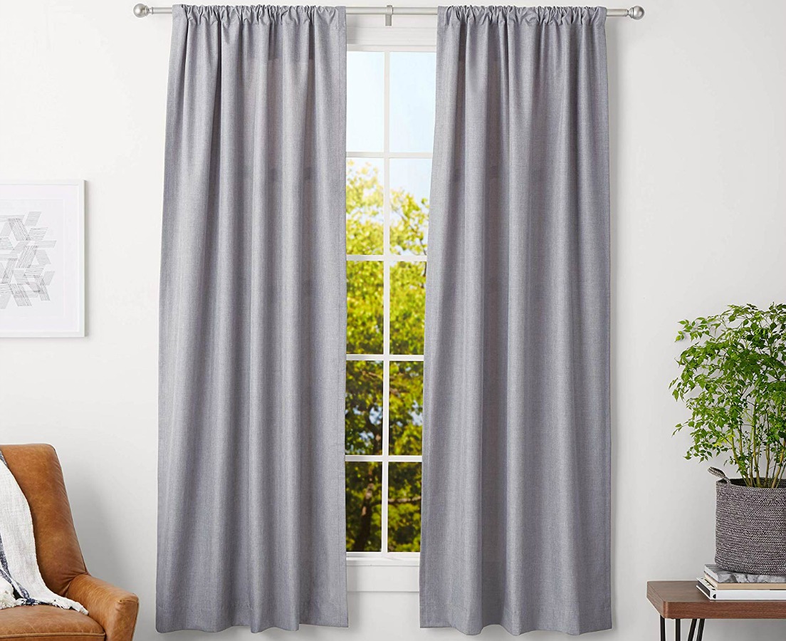 gray curtain and curtain rod hanging in living room