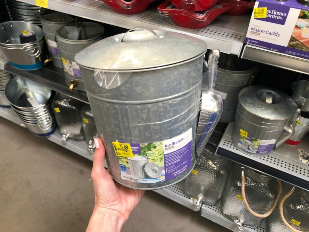 hand holding galvanized ice bucket in store