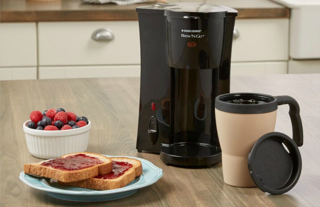 Black + Decker Brew 'n Go on kitchen counter with toast and berries