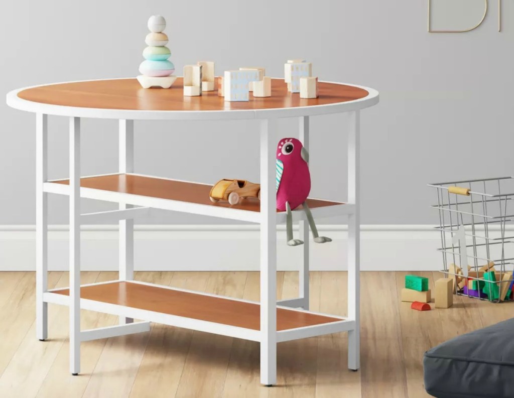 Kids Activity table in bedroom with grey walls and hardwood floors