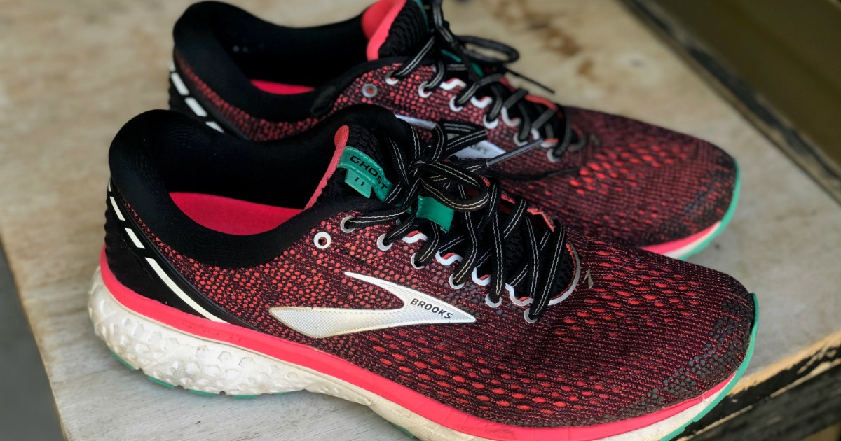 Pair of Brooks Ghost 11 Women's Running Shoes on bench