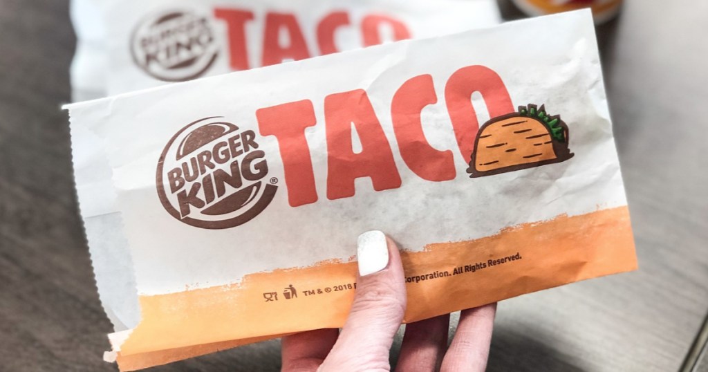 Ladies hand holding a Burger King Taco