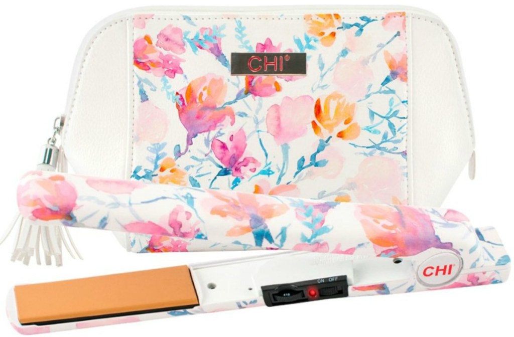 CHI brand curling iron next to matching floral print bag