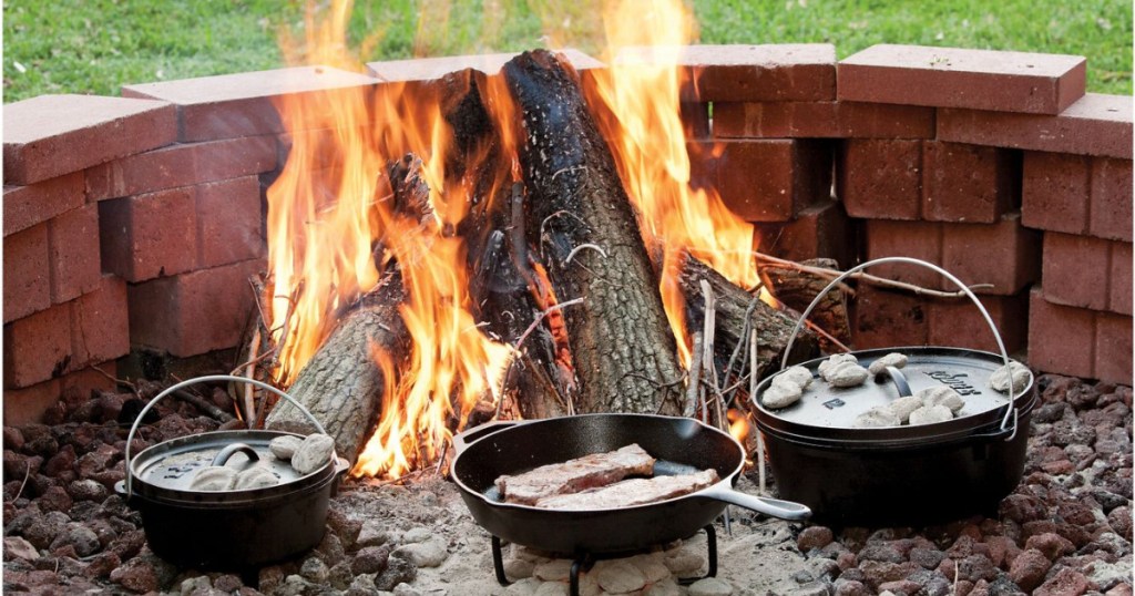 cast iron skillets in fire outside