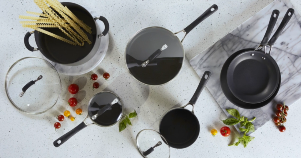 Circulon 10-Piece Hard Anodized Cookware Set on counter with veggies and pasta