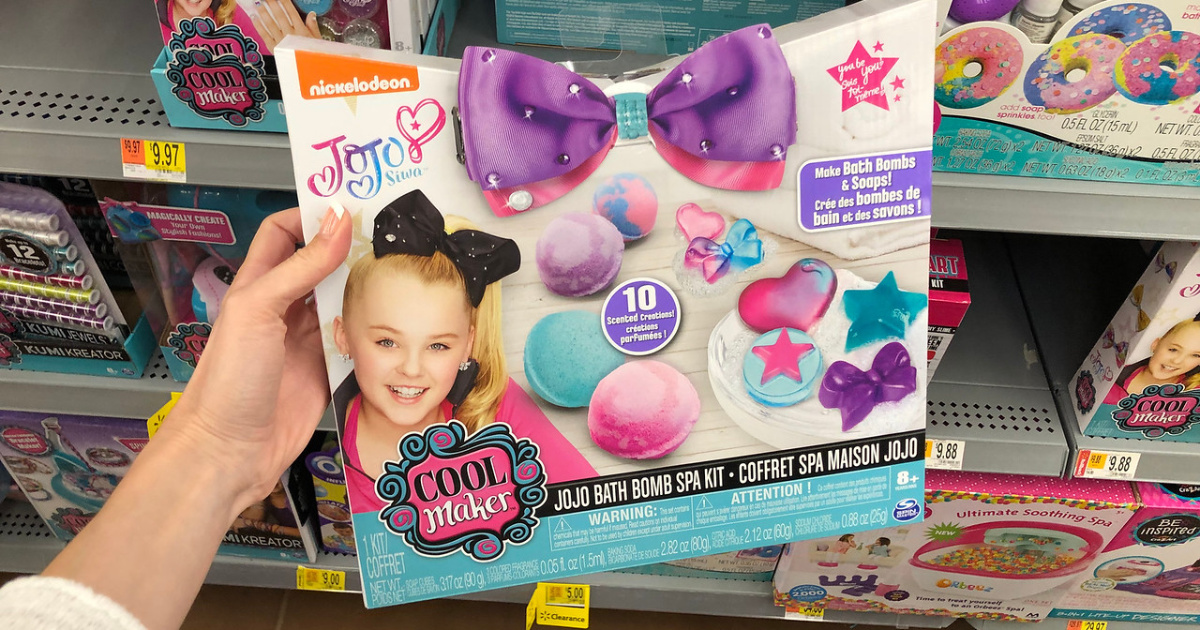 woman holding jojo siwa bath bombs at walmart