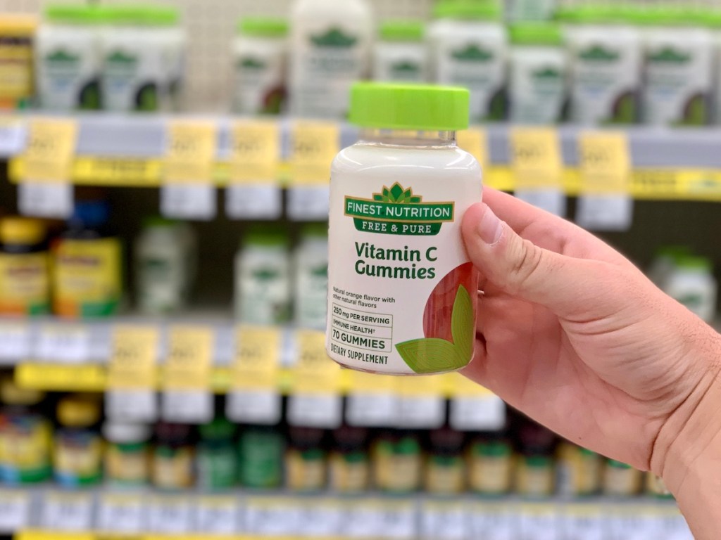 hand holding Finest Nutrition Free & Pure Vitamin C Gummies
