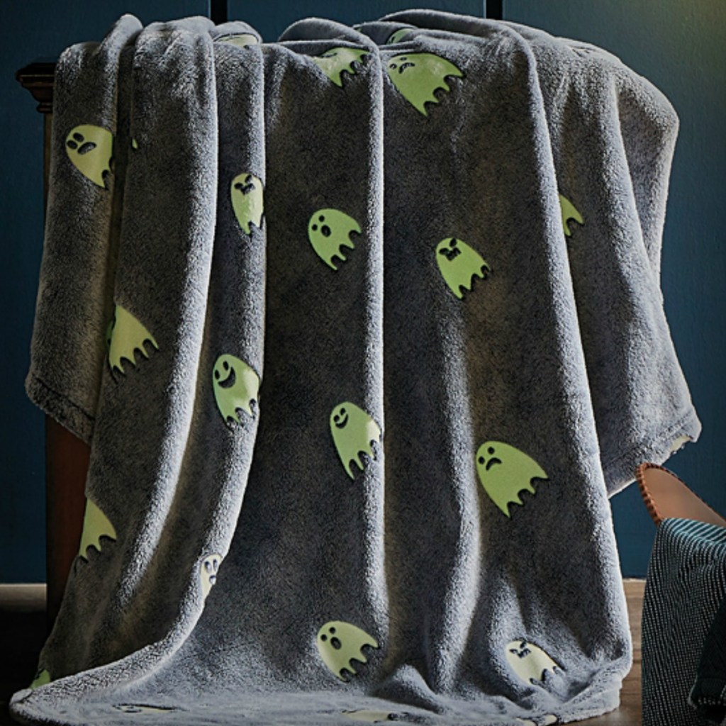 Gray plush blanket with ghost print